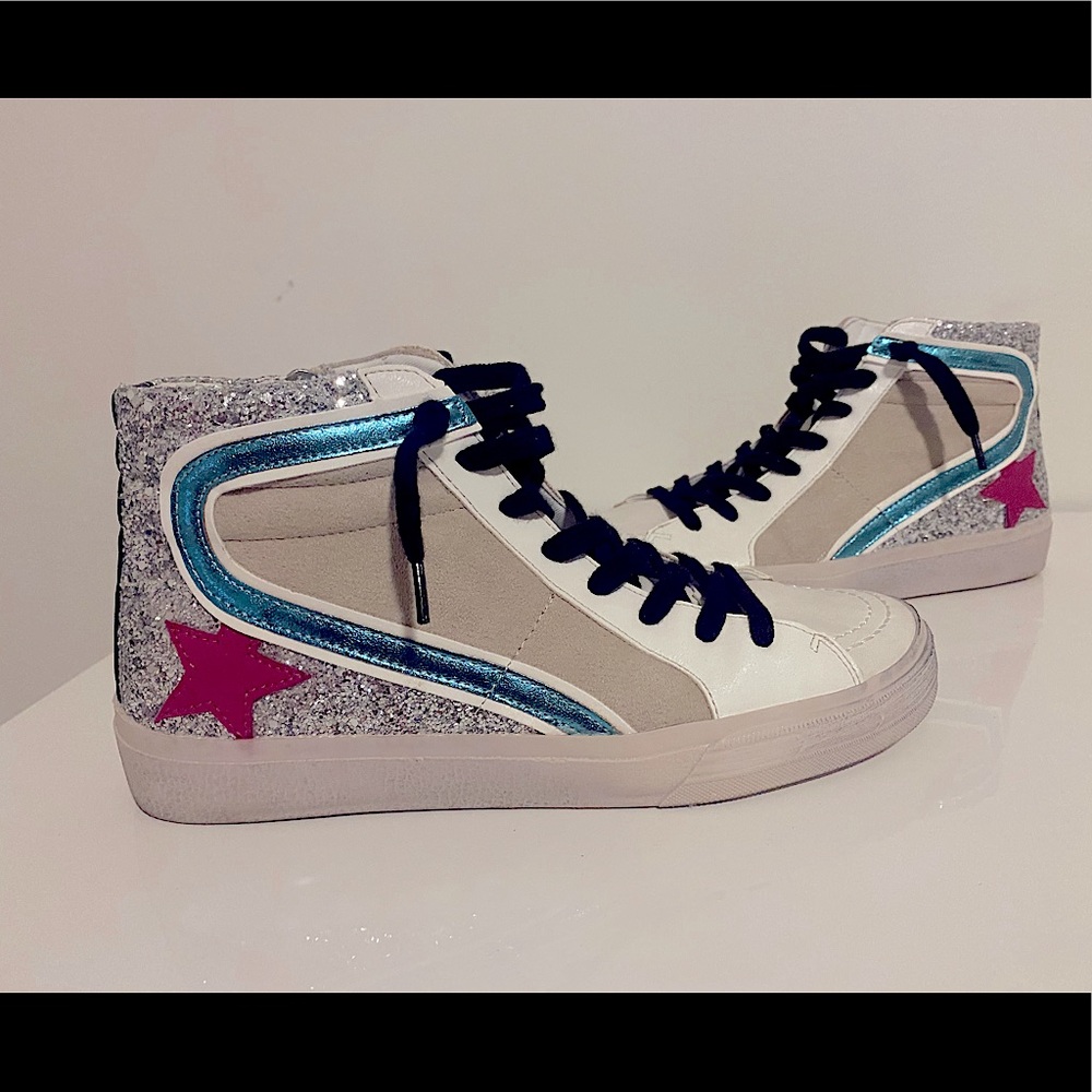 Super cute and trendy high top shoes worn once